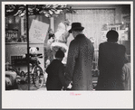 Window shoppers watching toy display in downtown Providence, Rhode Island