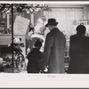 Window shoppers watching toy display in downtown Providence, Rhode Island
