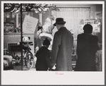 Window shoppers watching toy display in downtown Providence, Rhode Island