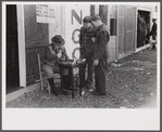 A variety of entertainment booths have sprung up just outside the Camp Stewart grounds near Hinesville, Georgia.