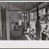 On the porch of a general store in Hinesville, Georgia.