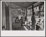 On the porch of a general store in Hinesville, Georgia.