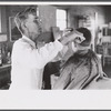 Mr. J.H. Parham, barber and notary public in Centralhatchee, Heard County, Georgia.