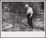 Judge James B. Park with remnants of the old Parks Mill, Georgia.