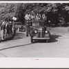 Mill workers who lived largely in rural areas being taken through CIO picket line at a textile mill in Greensboro, Georgia. The lockout lasting about three months ending in a signed contract.