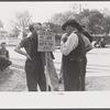 Greensboro chief of police reading CIO picket sign at a textile mill in Greensboro, Greene County, Georgia.