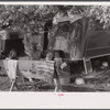 In a trailer camp in Childersburg, Alabama. Many workmen and their families living here are either waiting for job openings or already have jobs at the nearby powder plant.