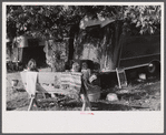 In a trailer camp in Childersburg, Alabama. Many workmen and their families living here are either waiting for job openings or already have jobs at the nearby powder plant.