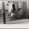 Playing cards at a filling station in Childersburg, Alabama.