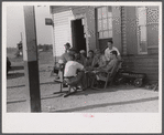 Playing cards at a filling station in Childersburg, Alabama.
