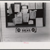 Signs on the post office bulletin board in Childersburg, Alabama.
