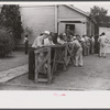 Filling out applications for employment at the Du Pont powder plant near Childersburg, at the employment office in Sylacauga, Alabama.
