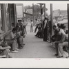 Workers, some of them unemployed, on the main street of Childersburg, Alabama.