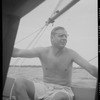 Unidentified person (Harvey?) on a boat