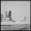 Boot and high heeled shoe