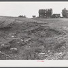 A dried up creek and old farmhouse near Townsend, New York.