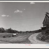 Mr. Arthur Wolf driving his team of horses on his farm in North Branford, Connecticut.