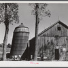 Silo leaning dangerously on a farm in North Branford, Connecticut .