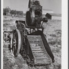 Potato digger on a field near Caribou, Maine.