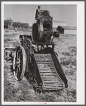 Potato digger on a field near Caribou, Maine.