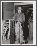 Weighing sacks of potatoes for shipment at the Woodman Potato Company. Caribou, Maine.
