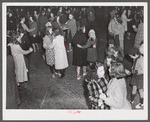 The evening program after the Barrel Rolling Contest consisted of dancing in the street (plenty of jitterbugging). Presque Isle, Maine.