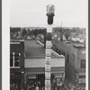 The "Pototem" pole standing in the main street of Presque Isle, Maine, as an advertisement for the barrel rolling contest.
