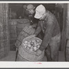 Unloading potatoes at the Woodman Potato Company in Caribou, Maine.