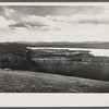 View looking over Weld village and Weld Lake towards Dixfield, Maine.