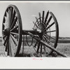 Giant wheels ten feet in diameter, once used for carrying logs to sawmill, Michigan.