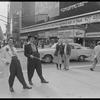 Publicity photograph of Daniel Valdez and Edward James Olmos posing in Times Square during the stage production Zoot Suit