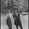 Publicity photograph of Daniel Valdez and Edward James Olmos posing in Times Square during the stage production Zoot Suit