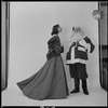 Unidentified models, one as Santa Claus
