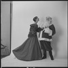 Unidentified models, one as Santa Claus