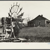 Dwelling and portable windmill of a farmer on land to be optioned by Resettlement Administration. Near Ithaca, New York, Tompkins County.
