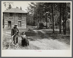 Father and daughter on resettled farm. Beltami Island reforestation project, Minnesota.