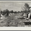 Street lined with partially-completed homes. Newport News Homesteads, Virginia.