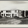Rear view of completed two-family house. Greenbelt, Maryland.