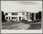Rear view of completed two-family house. Greenbelt, Maryland.