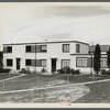 Rear view of completed two-family house. Greenbelt, Maryland.