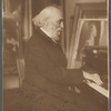 Prof. Frederick Bristol seated at piano