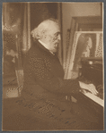 Prof. Frederick Bristol seated at piano