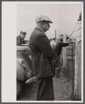 Spectator at the auto races at the Champlain Valley Exposition at Essex Junction, Vermont.