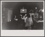 Demonstrating a vegetable slicer at the Champlain Valley Exposition, Essex Junction, Vermont.