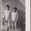 Two of the Gaynor children going to bed on their farm near Fairfield, Vermont.