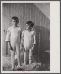 Two of the Gaynor children going to bed on their farm near Fairfield, Vermont.