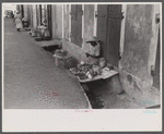 Charlotte Amalie, St. Thomas Island, Virgin Islands. Vegetable vendor along a side street near the waterfront.