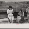 In the fishing village of Puerto Real, many women take in needlework to do at home to supplement their income from fish. The gloves which these women are stitching are being done for a firm in Mayaguez and will eventually be sold in New York. Puerto Rico.