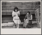 In the fishing village of Puerto Real, many women take in needlework to do at home to supplement their income from fish. The gloves which these women are stitching are being done for a firm in Mayaguez and will eventually be sold in New York. Puerto Rico.