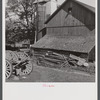 Old boards and rusty nails piled up where they might be dangerous. Farm of Mr. Theodore German. North Branford, Connecticut.